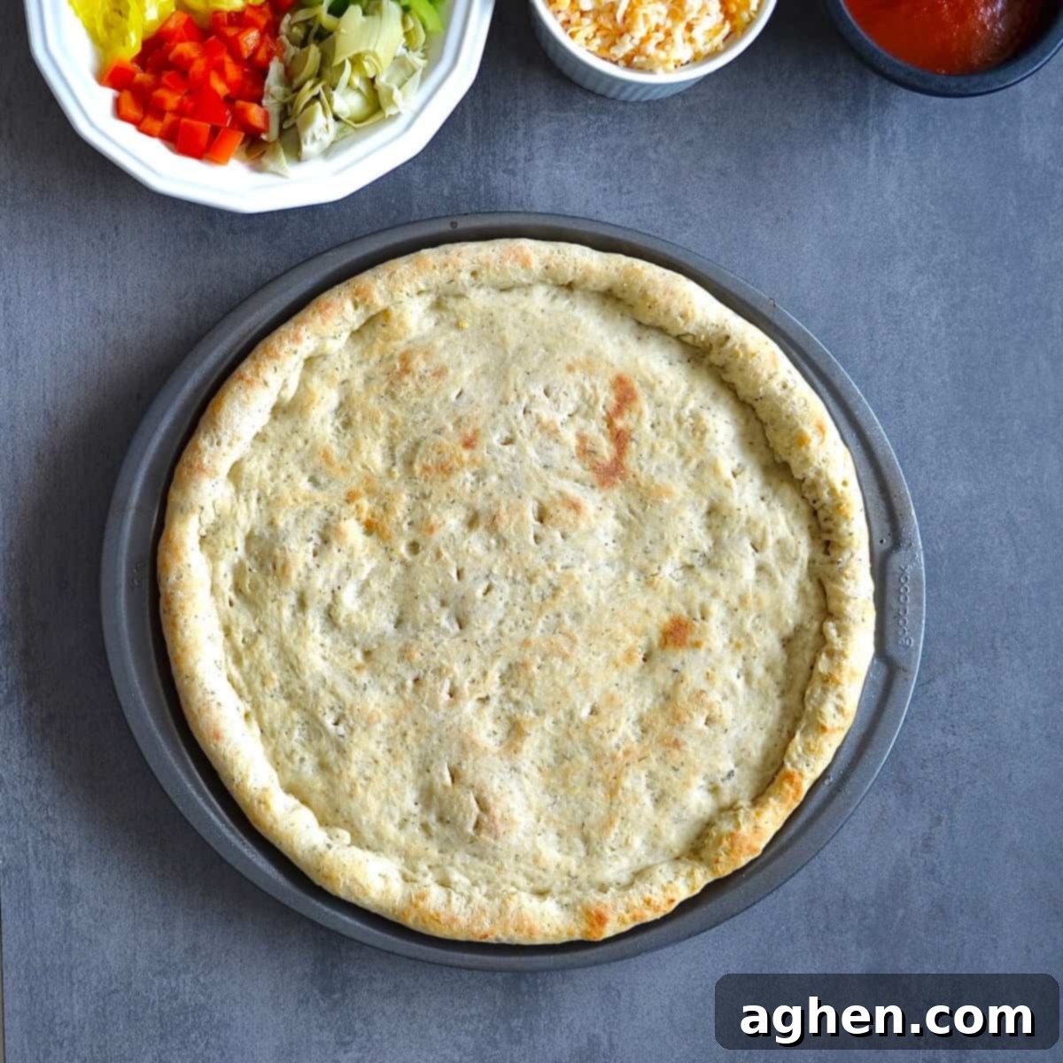 Homemade Weight Watchers Pizza: Why You'll Never Go Back to Store-Bought 6 Parbaked pizza crust with a light golden hue.