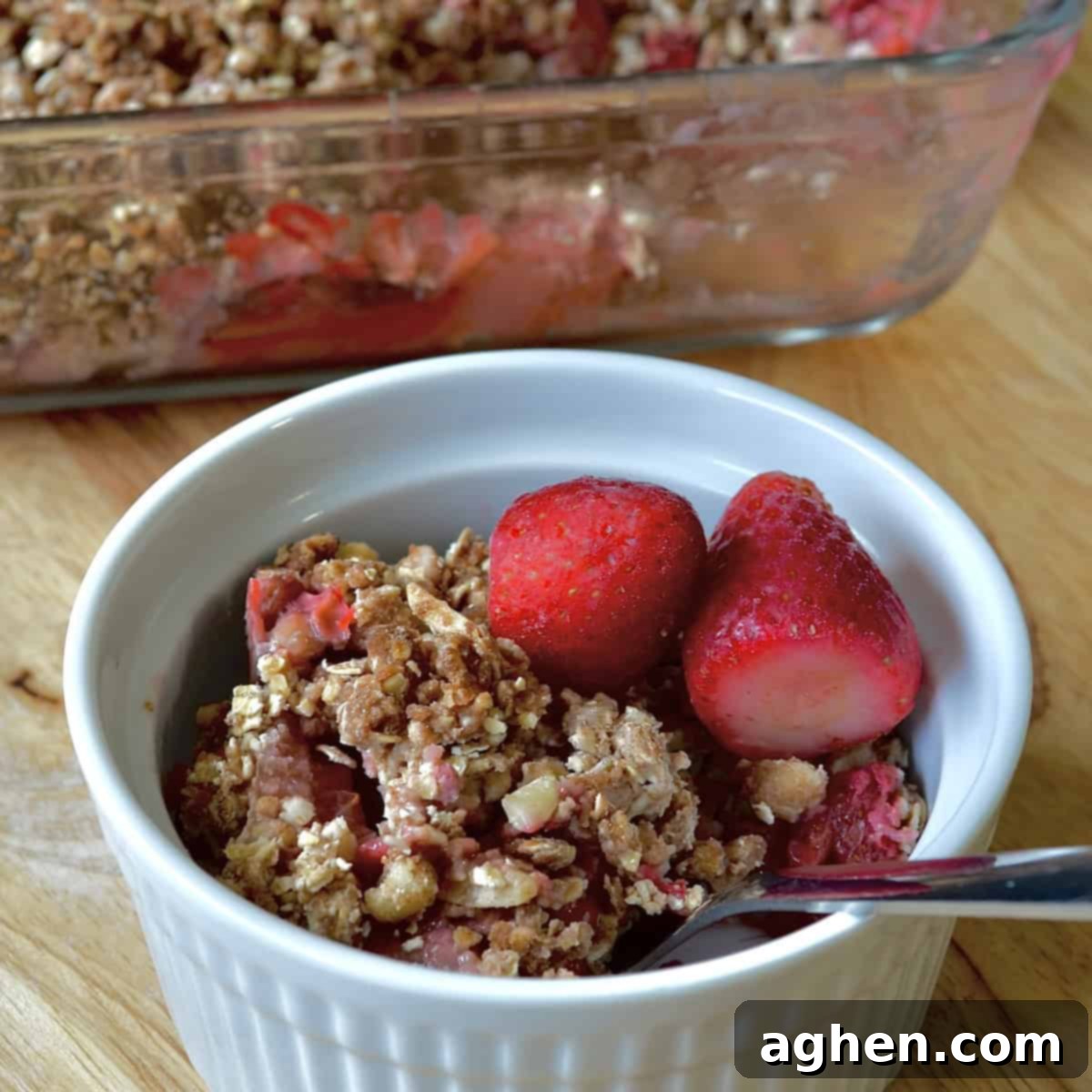 Guilt-Free Strawberry Rhubarb Crisp 2 Delicious individual serving of Weight Watchers strawberry rhubarb crisp in a ramekin
