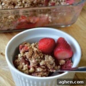 Guilt-Free Strawberry Rhubarb Crisp 7 A single serving of freshly baked Weight Watchers strawberry rhubarb crisp, perfectly golden and ready to enjoy