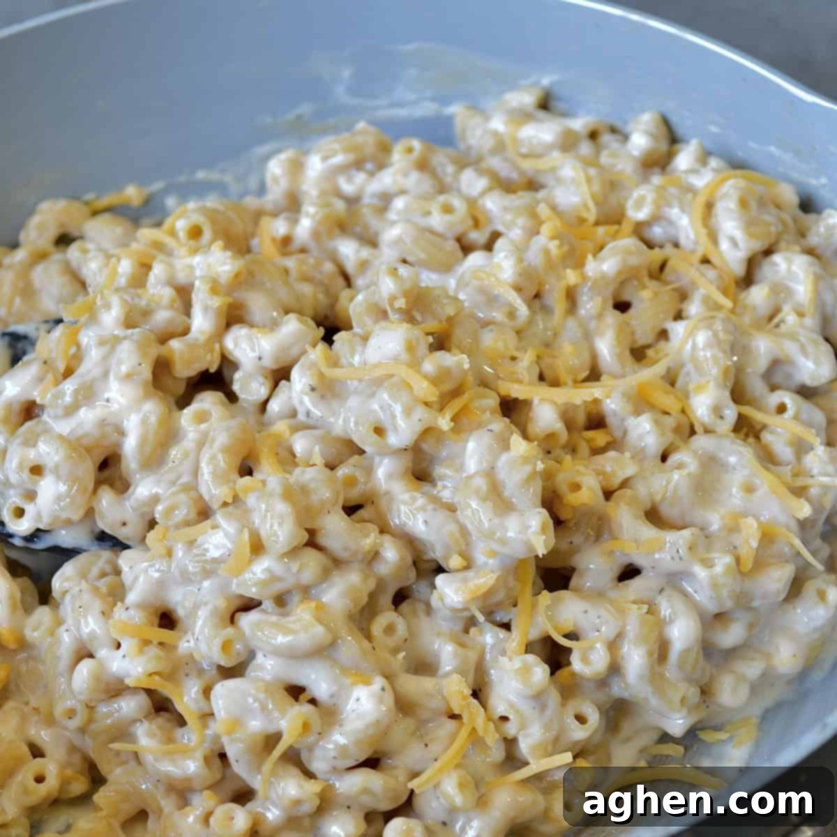 My 20-Minute Hack for Perfect Weight Watchers Mac and Cheese 6 Stirring mac and cheese in a pot