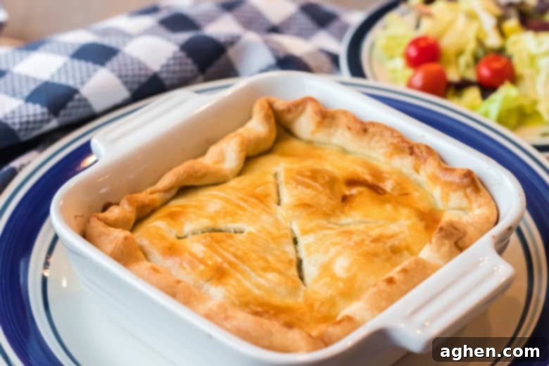 Individual Chicken Pot Pie served with a fresh side salad