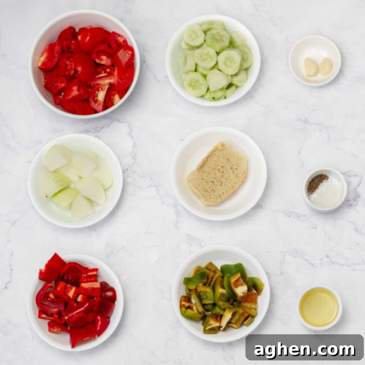 Gazpacho ingredients in separate dishes. 