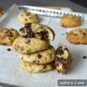 Stack of fluffy chocolate chip cookies, indicating a satisfying and substantial treat.
