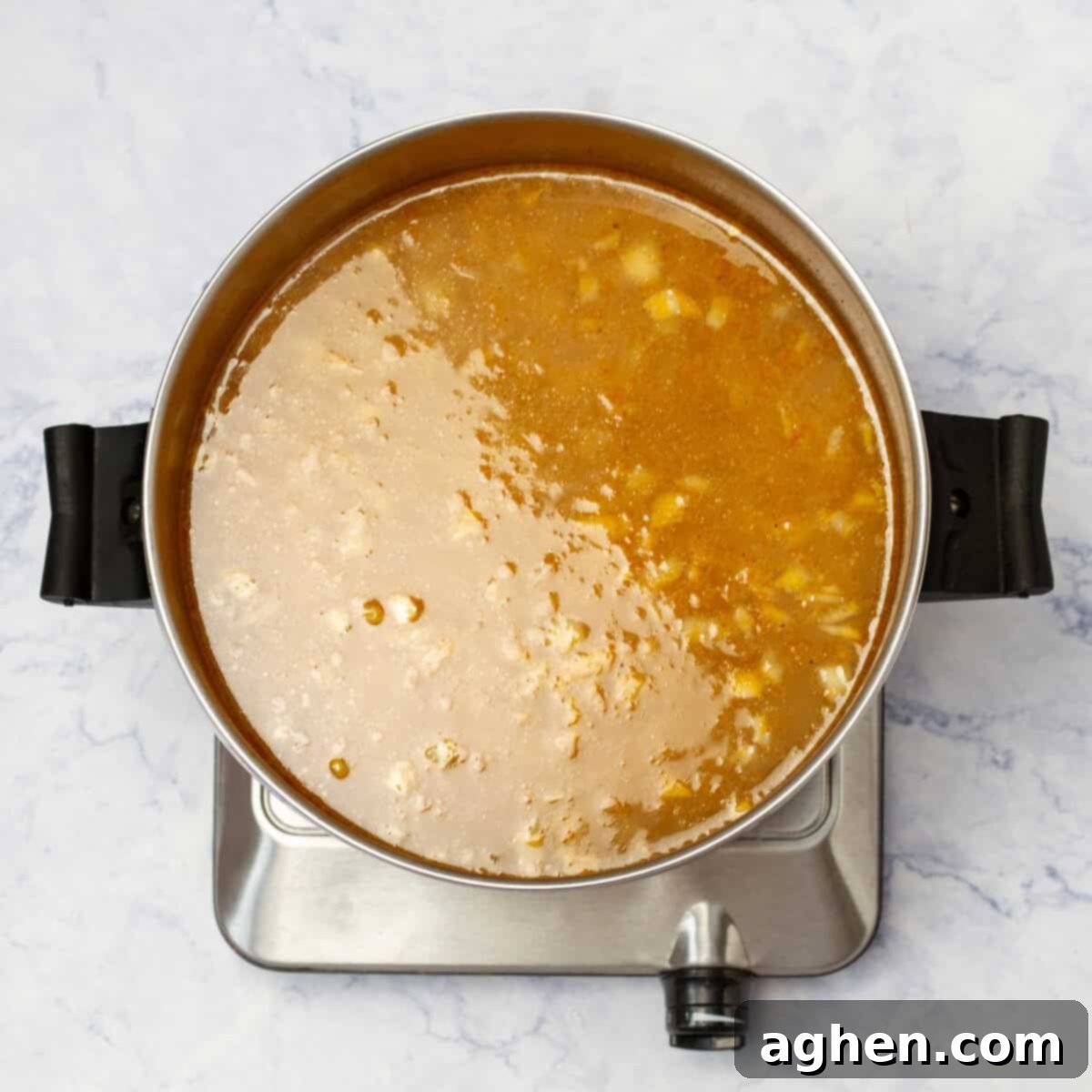 All the soup ingredients simmering together in a pot of flavorful broth, allowing the tastes to fully integrate.