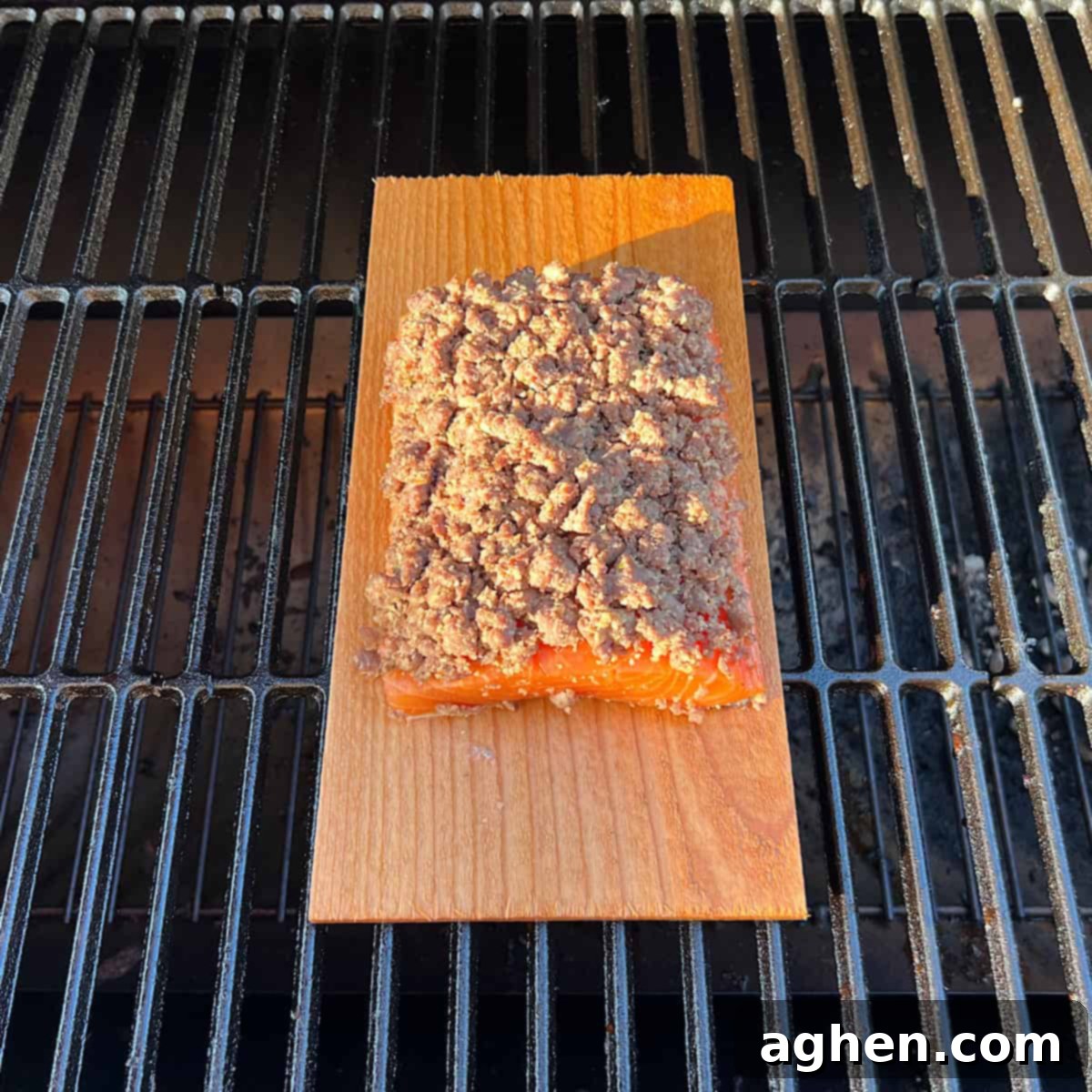 raw cedar planked salmon on grill