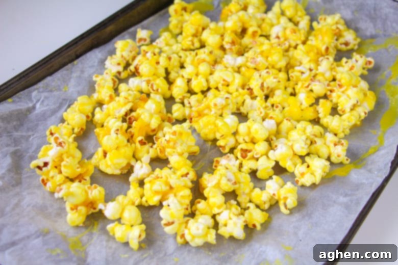Yellow Popcorn on lined baking sheet
