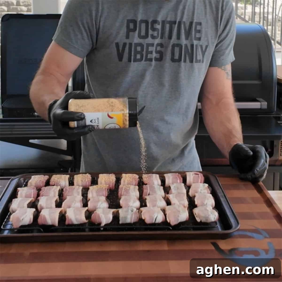 Seasoning bacon wrapped Oreos with honey chipotle rub
