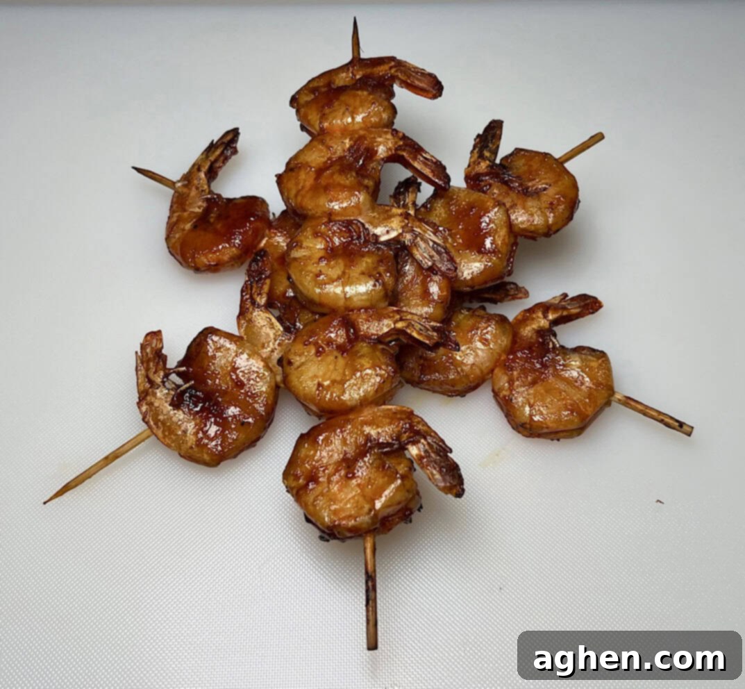 Smoked Shrimp: Effortlessly Delicious 3 Close-up of perfectly smoked shrimp on bamboo skewers