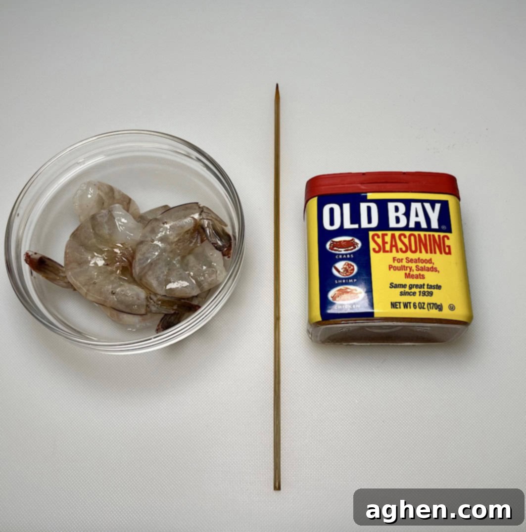 Smoked Shrimp: Effortlessly Delicious 4 Shrimp seasoned with Old Bay, ready for skewering