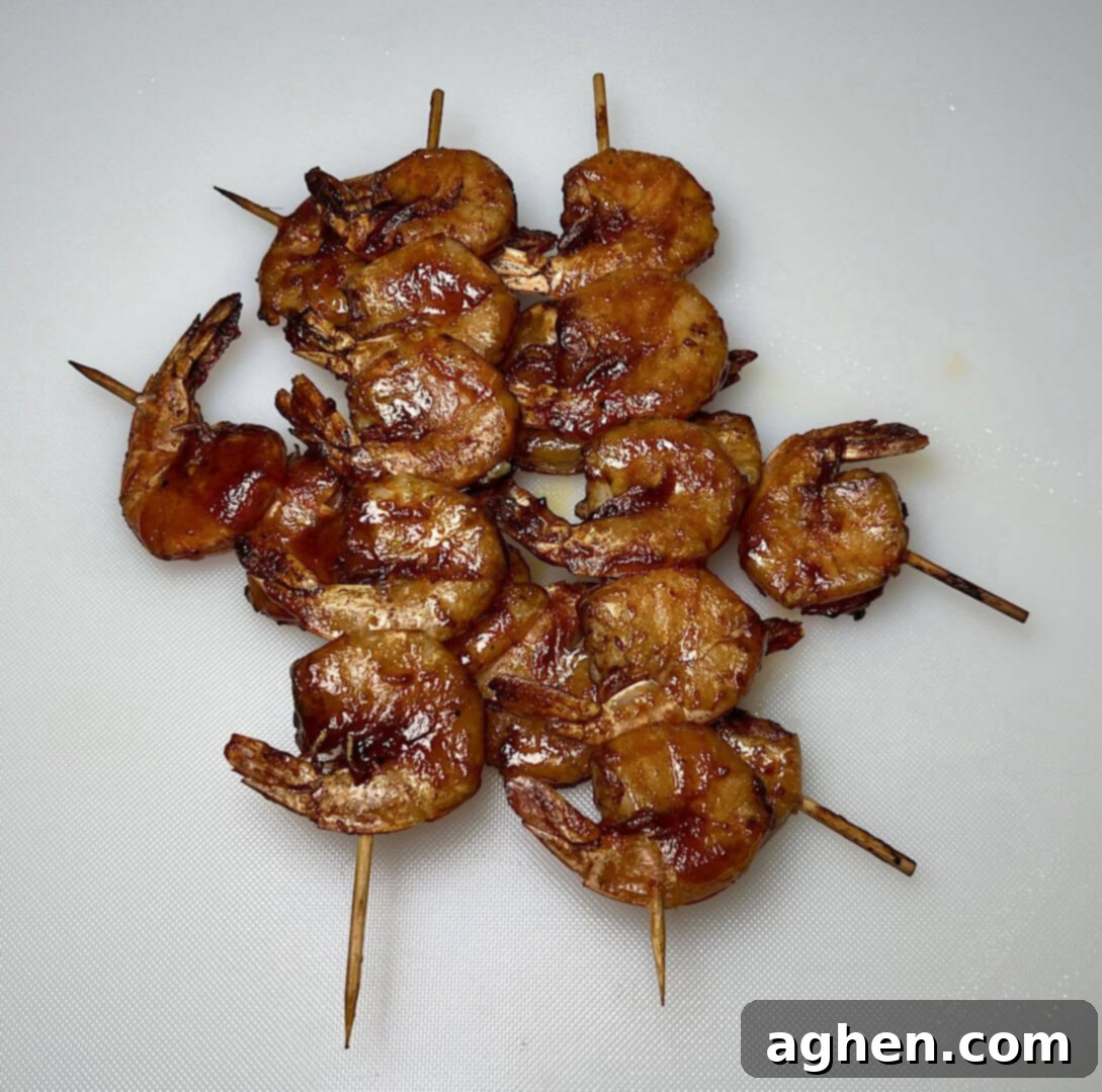 Smoked Shrimp: Effortlessly Delicious 9 Multiple smoked shrimp skewers arranged on a wire rack
