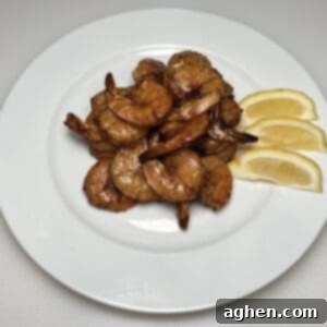 Smoked Shrimp: Effortlessly Delicious 10 Smoked shrimp skewers plated with lemon
