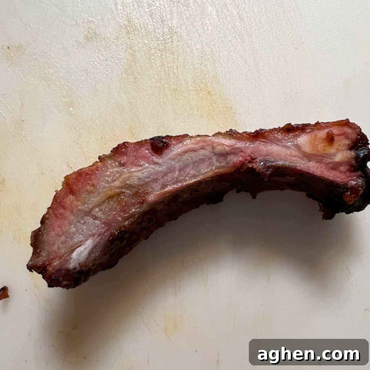 6 Blunders That Will Destroy Your Smoked Baby Back Ribs 14 Perfectly rested and sliced smoked baby back ribs, ready to serve.