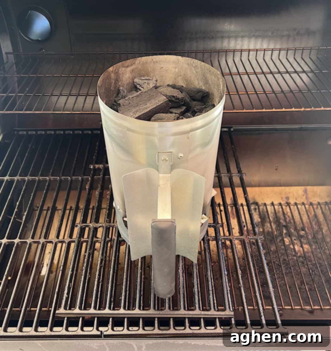 6 Blunders That Will Destroy Your Smoked Baby Back Ribs 4 Charcoal chimney starter in action, a safer way to light charcoal.
