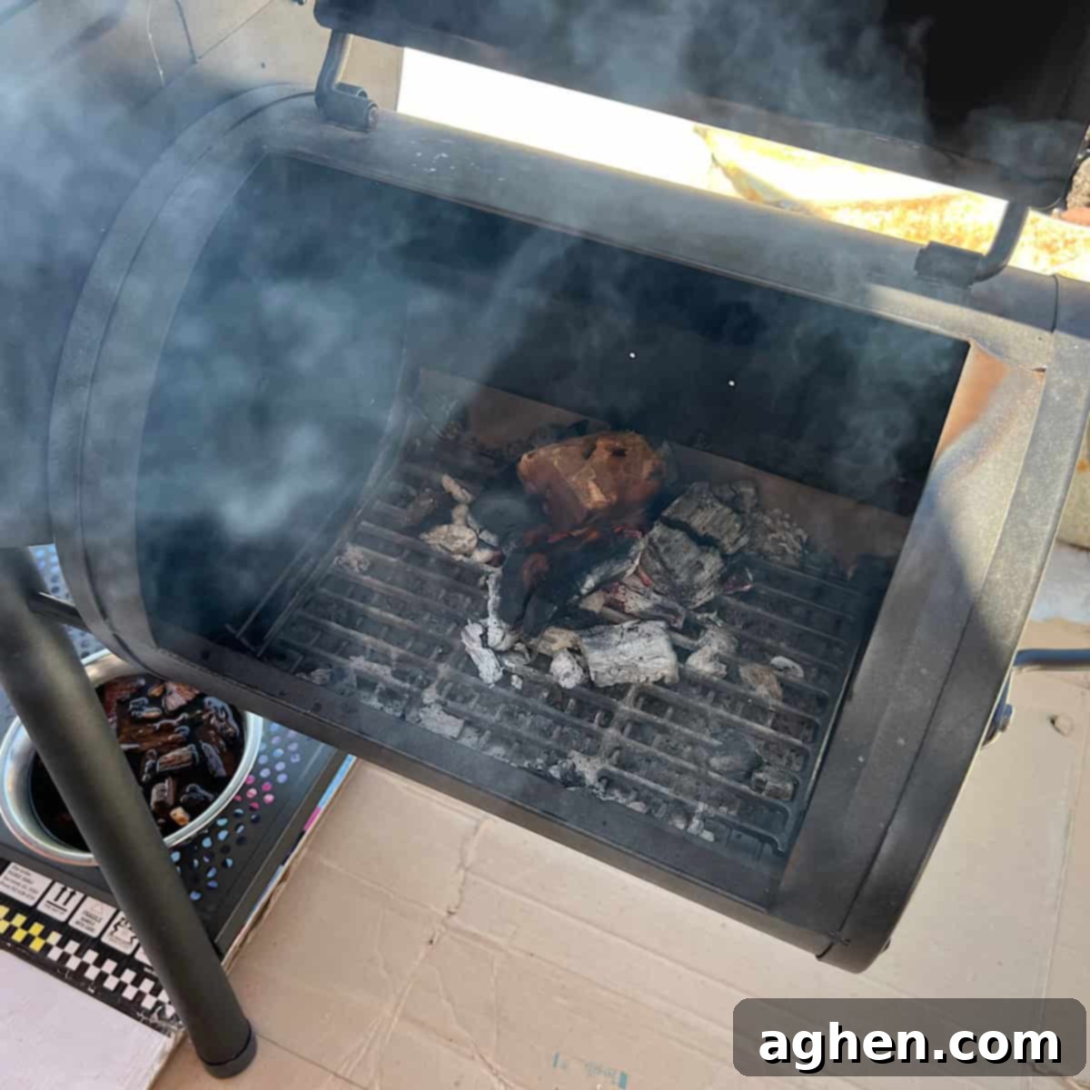 6 Blunders That Will Destroy Your Smoked Baby Back Ribs 9 A smoker maintaining a consistent temperature, with smoke gently rising.