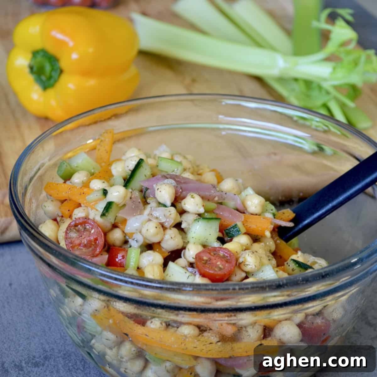 Weight Watchers Chickpea Salad: Your Refreshing Summer Side 5 Mixing chickpea salad ingredients