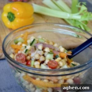 Weight Watchers Chickpea Salad: Your Refreshing Summer Side 7 Mixing chickpea salad ingredients