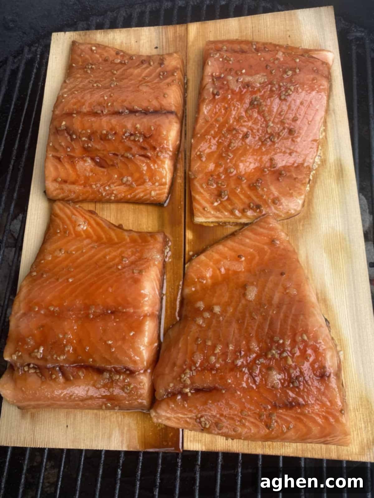 Grilled cedar plank salmon on a Weber grill.