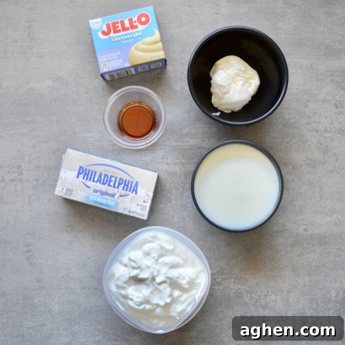 Weight Watchers' Legendary Cheesecake Fluff 3 Selection of ingredients for no-bake cheesecake fluff, including pudding mix, yogurt, and cream cheese.