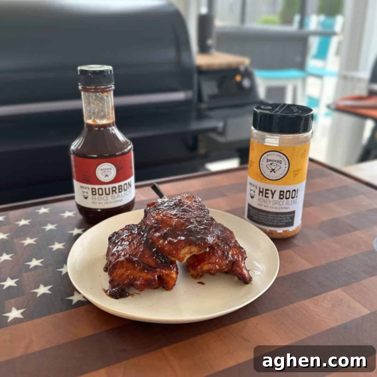 Perfectly smoked chicken thighs on a pellet grill, golden brown with crispy skin.