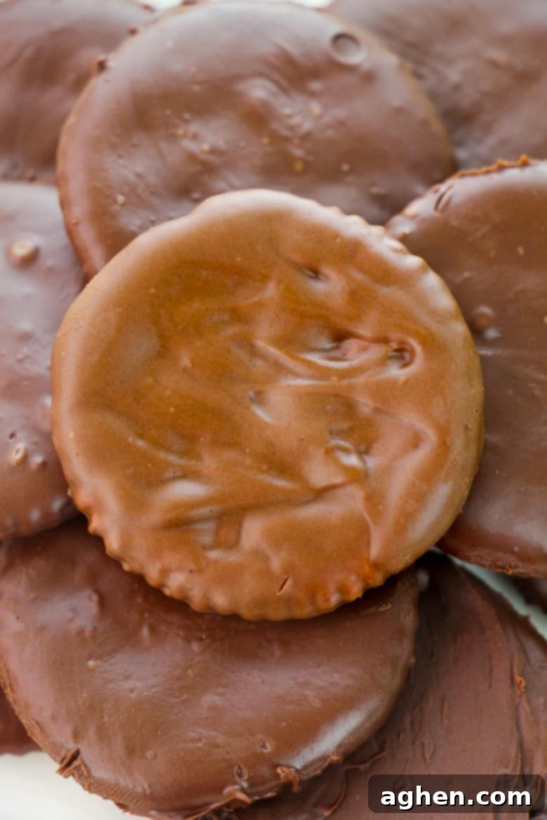 Ritz Thin Mints - A close-up of chocolate-dipped Ritz crackers, showcasing the smooth mint chocolate coating