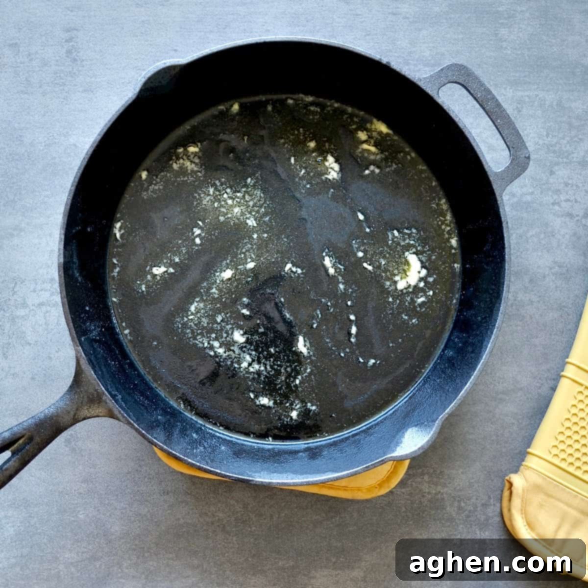 Cast iron skillet with melted butter