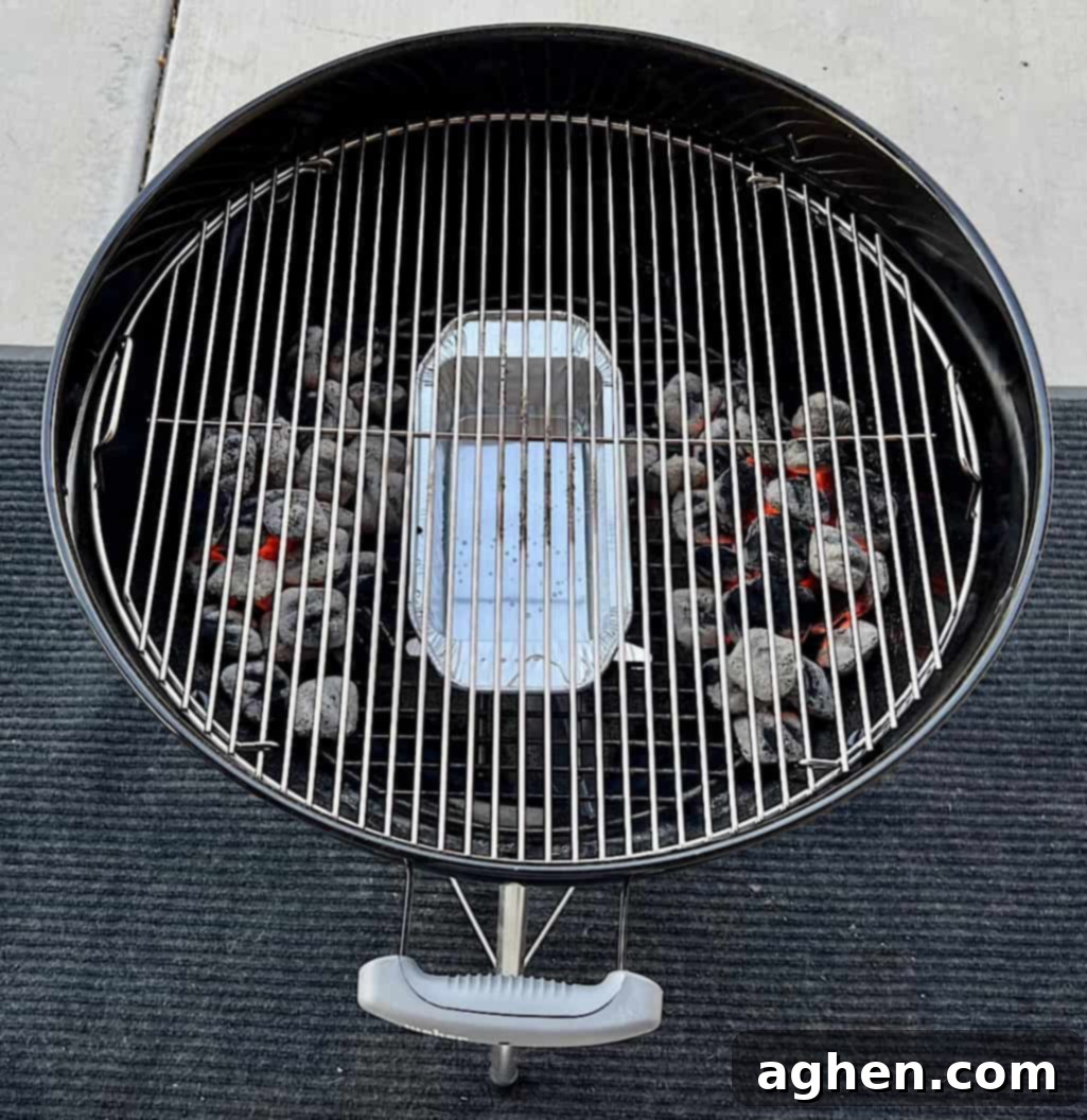 Aluminum loaf drip pan in Weber Kettle with water