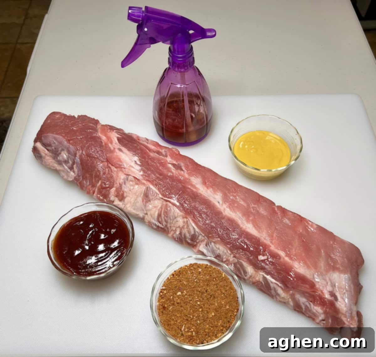 Essential ingredients laid out for baby back ribs recipe