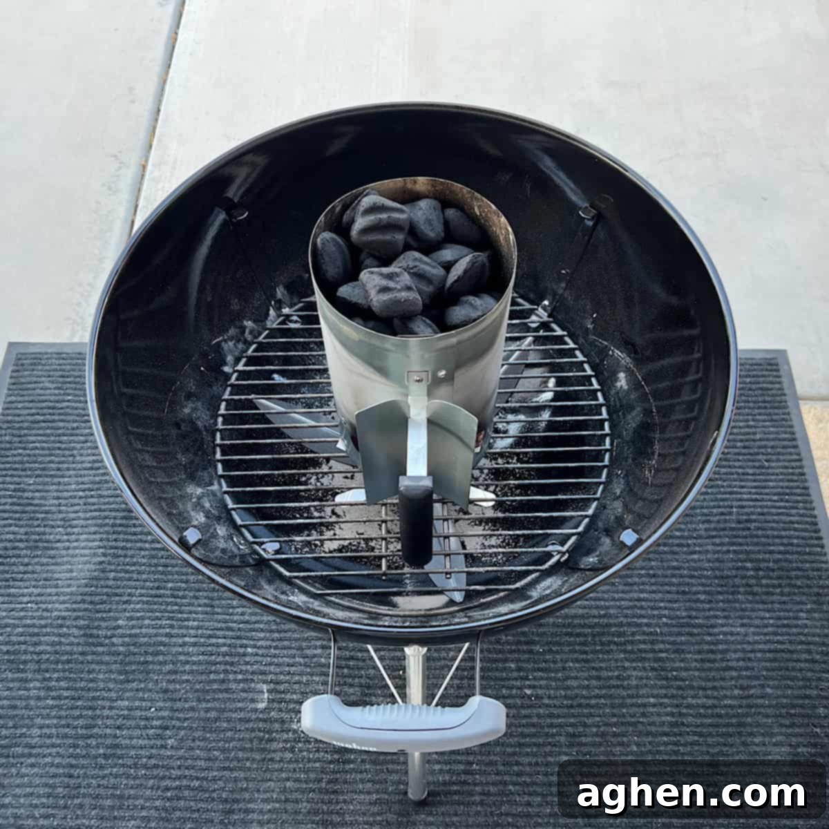 Charcoal chimney heating briquettes for Weber Kettle smoking