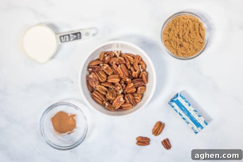 Ingredients for the rich pecan topping: butter, brown sugar, heavy cream, ground cinnamon, and whole pecans.