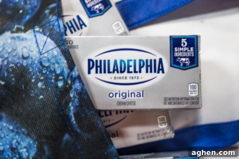 A block of Philadelphia Original Cream Cheese, highlighting its premium quality packaging.