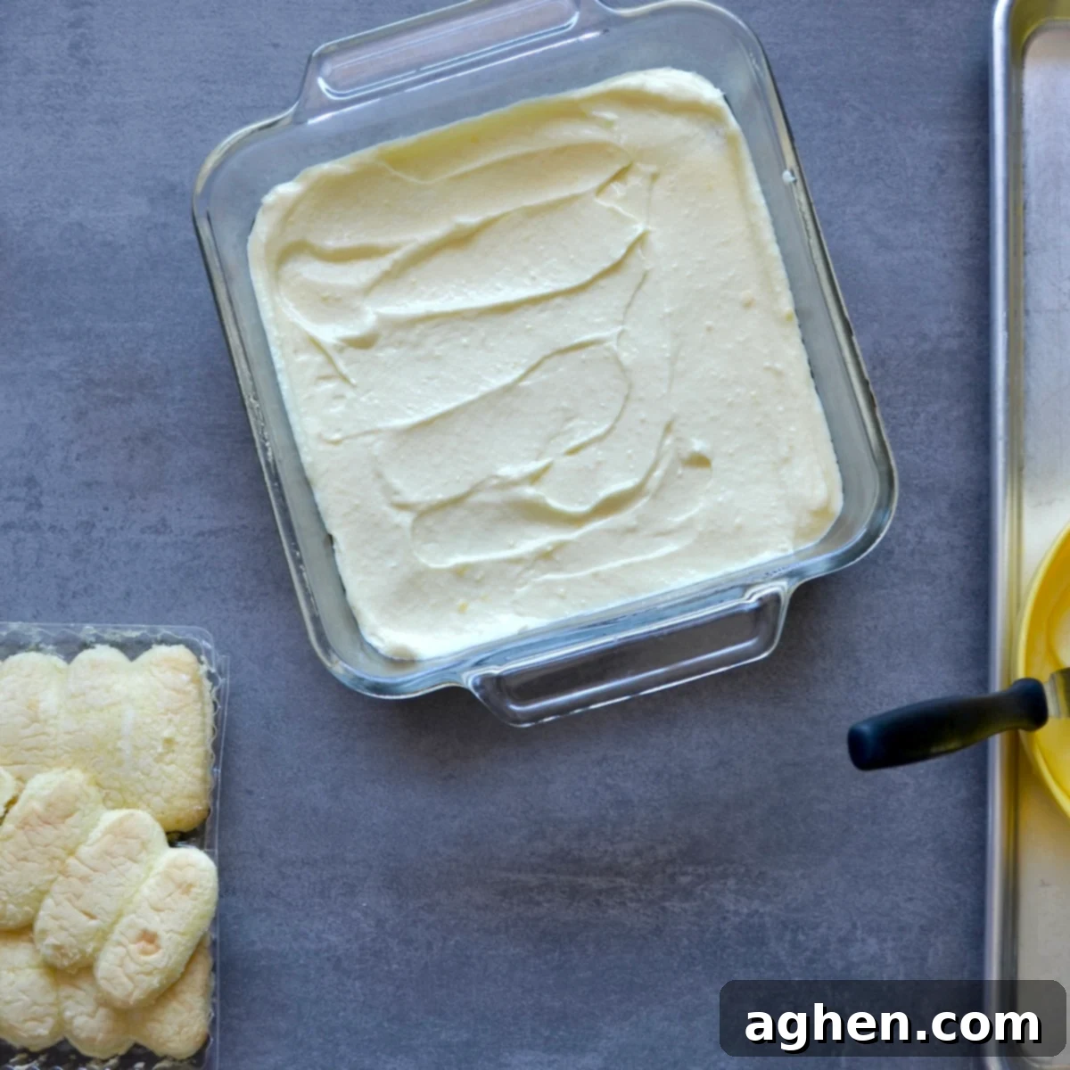 My New Obsession: The Weight Watchers Tiramisu I've Made 3 Weeks Running 6 Ricotta filling being smoothly spread over a layer of ladyfingers in a baking dish