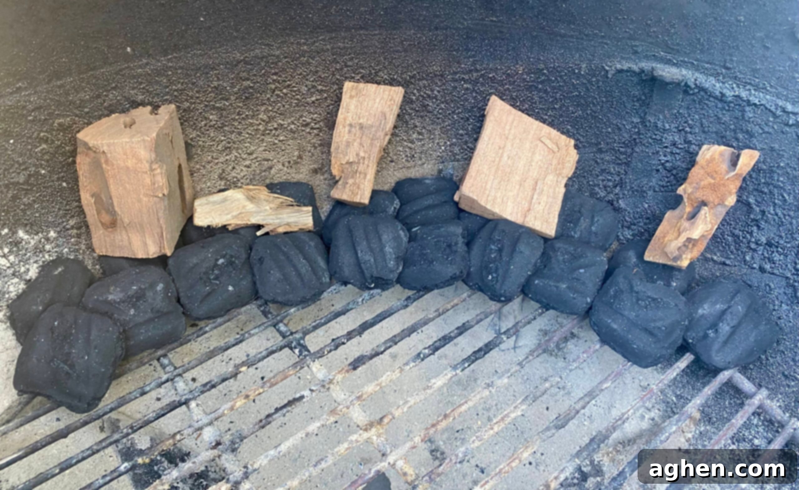 Various wood chunks and chips for smoking meat on a Weber grill