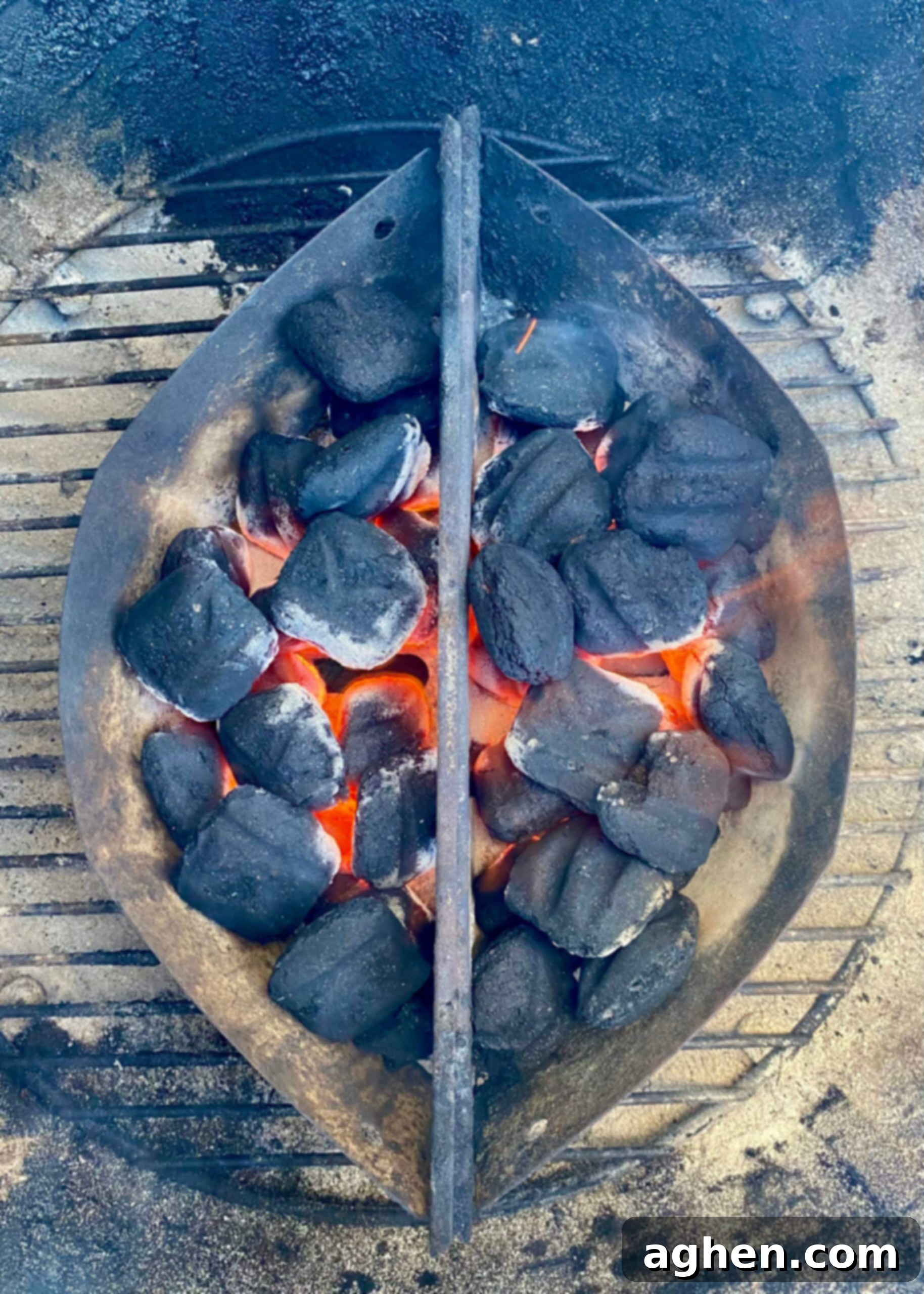 Two-zone charcoal grilling setup with direct and indirect heat for versatile cooking.