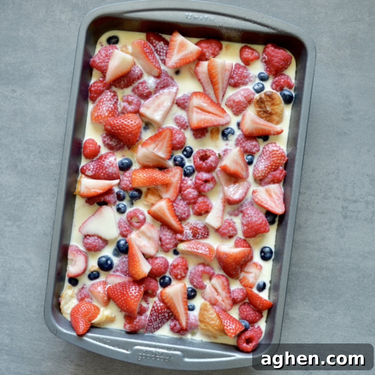 Berry croissant casserole before baking