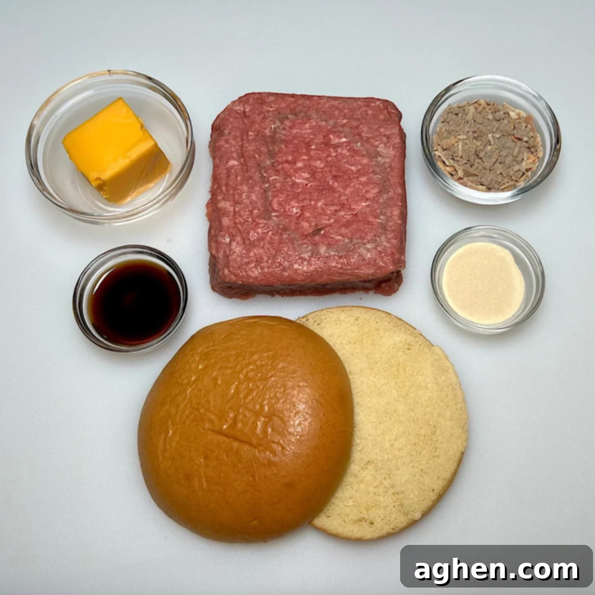 Ingredients for Juicy Lucy burger including ground beef, spices, and cheese