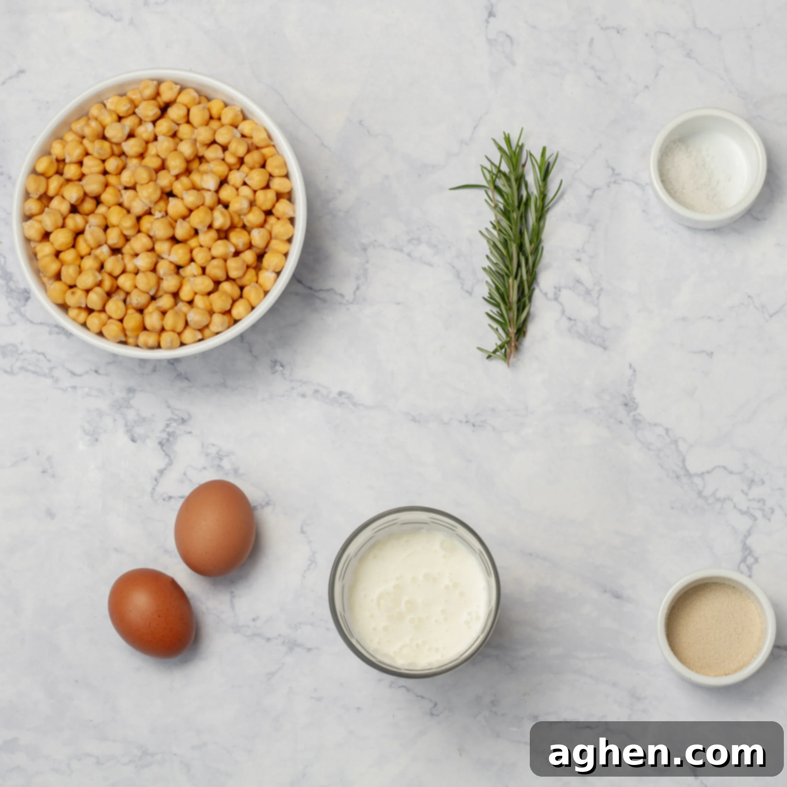 Instagram's Viral Chickpea Bread A Weight Watchers Dream 3 Various chickpea bread ingredients laid out in separate dishes, including chickpeas, eggs, milk, rosemary, and yeast.