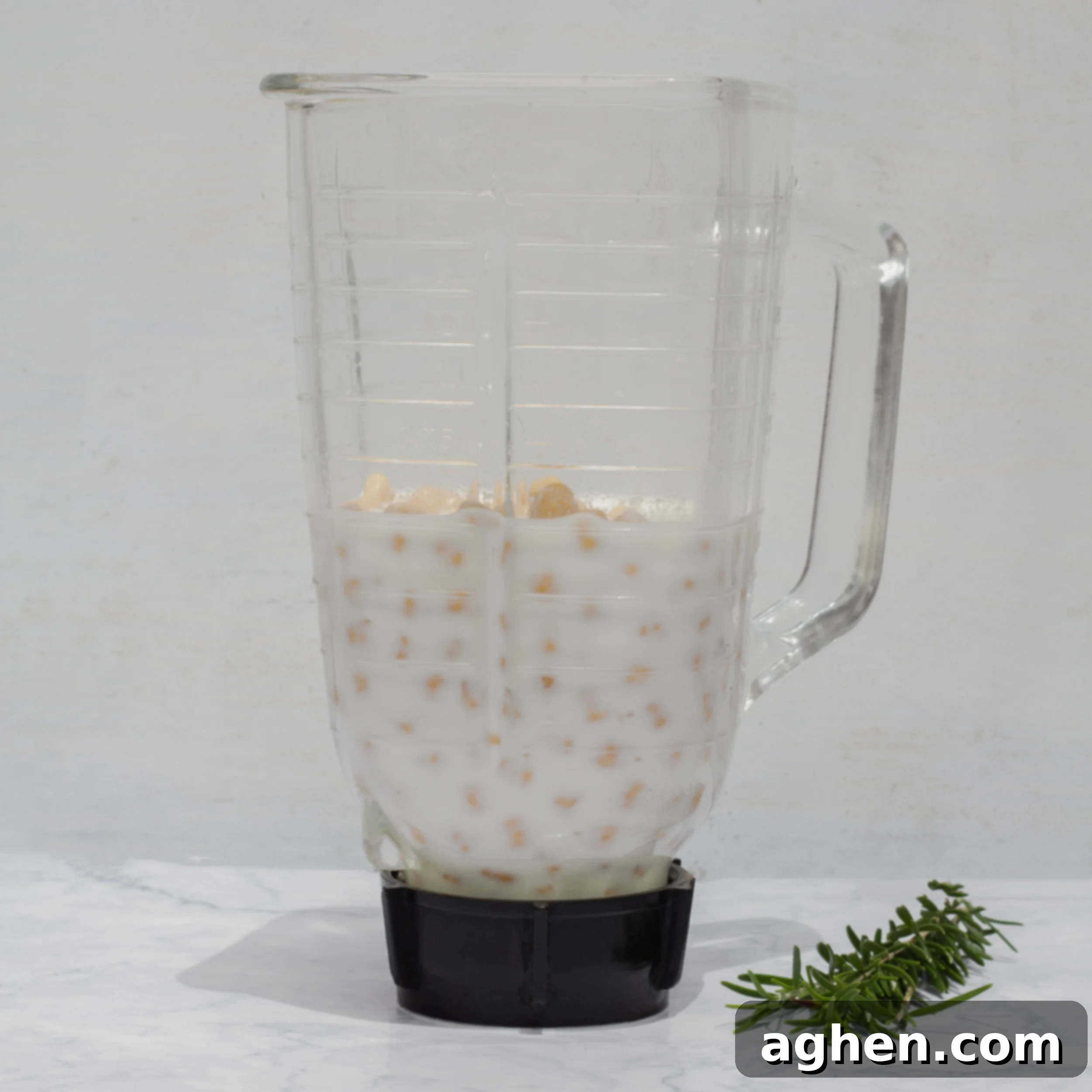 Instagram's Viral Chickpea Bread A Weight Watchers Dream 4 Wet ingredients (chickpeas, eggs, milk) being blended in a high-powered blender for the chickpea bread.