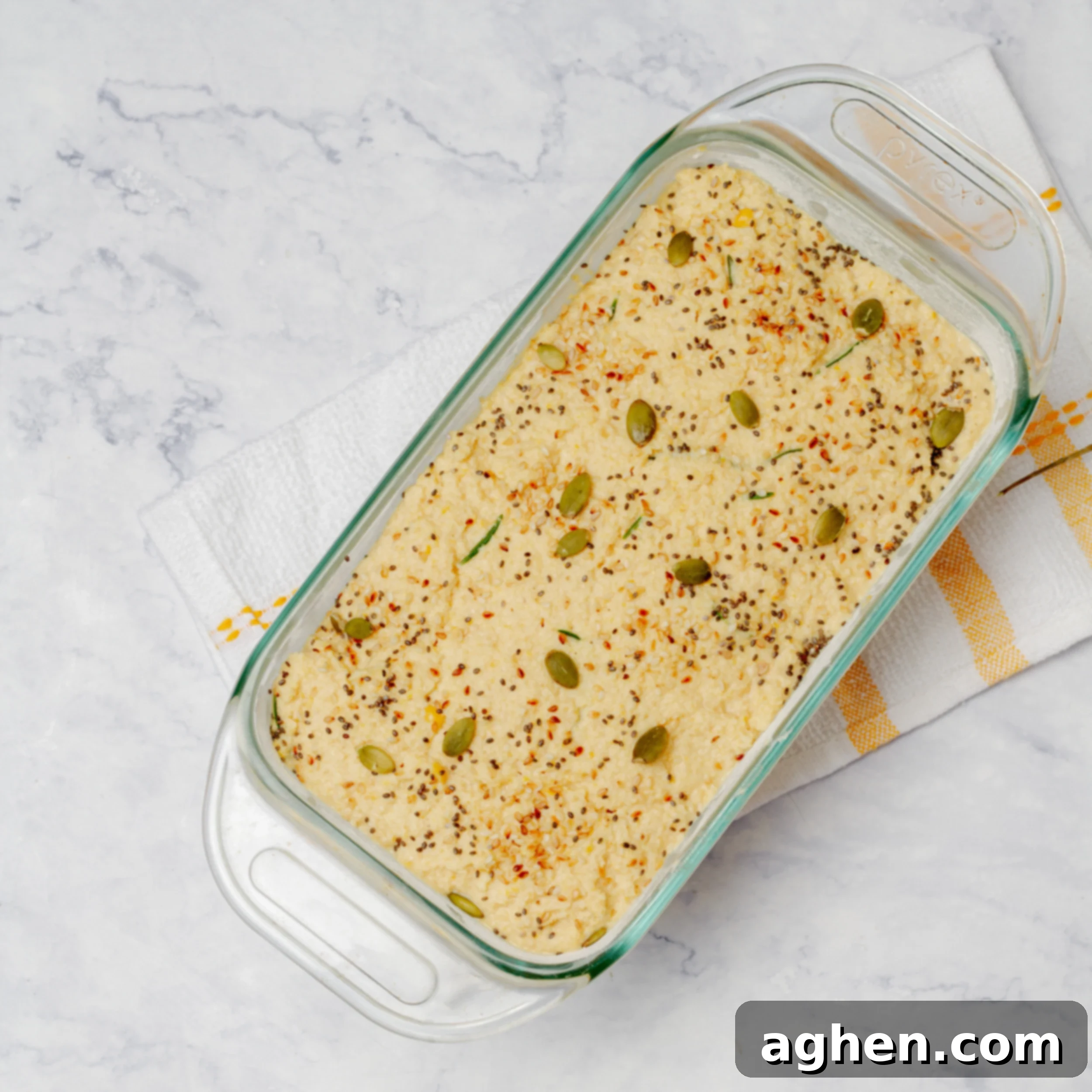 Instagram's Viral Chickpea Bread A Weight Watchers Dream 6 Chickpea bread dough resting and rising in a greased loaf pan before baking.