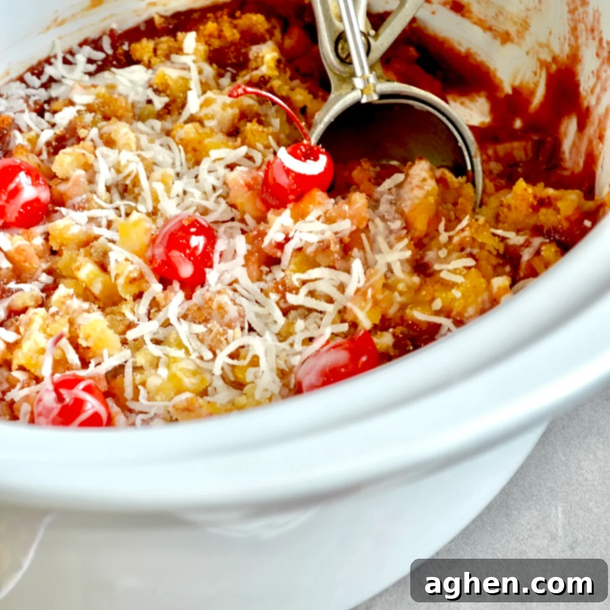 Scooping baked dump cake