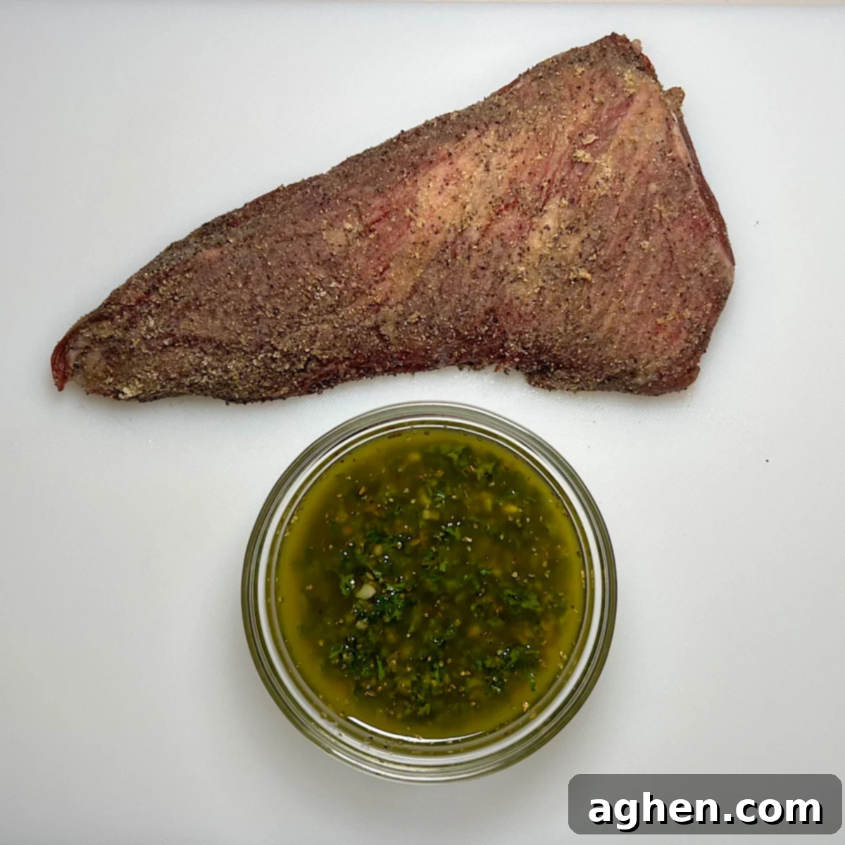 rubbed tri-tip with chimichurri sauce