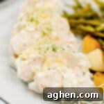 Creamy garlic chicken with green beans, potatoes, and creamy garlic sauce