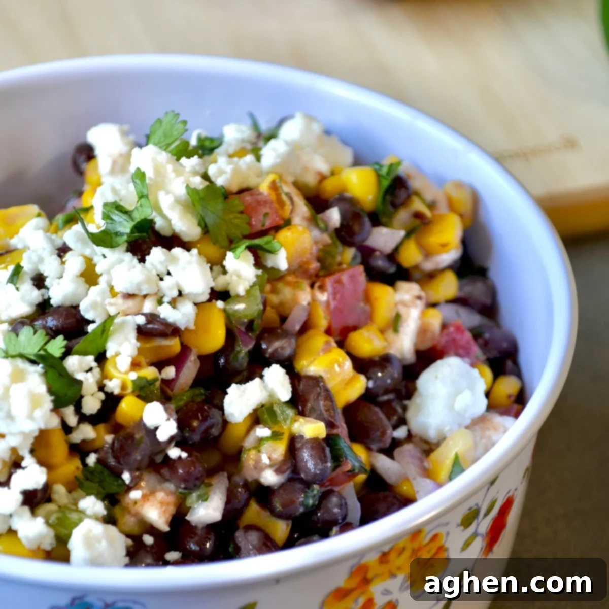 Weight Watchers' Favorite Black Bean and Corn Salad 5 Black bean and corn salad with cheese on top