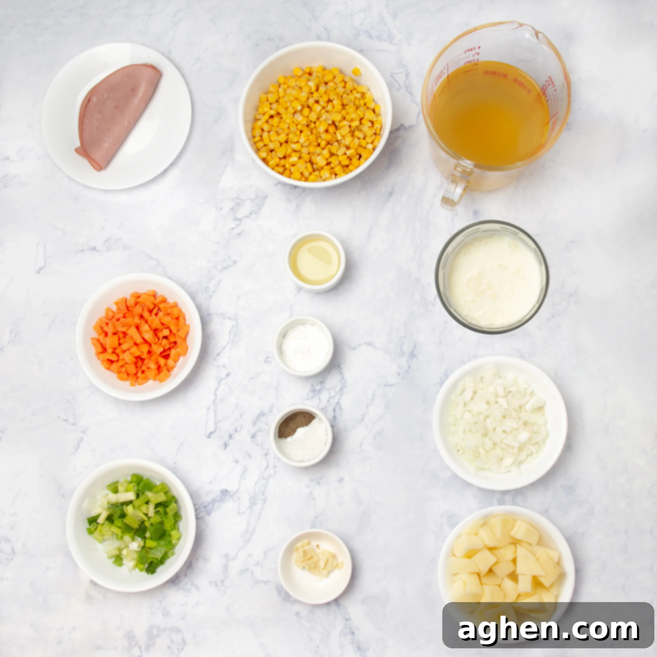 Corn chowder soup ingredients in separate dishes on a counter. 