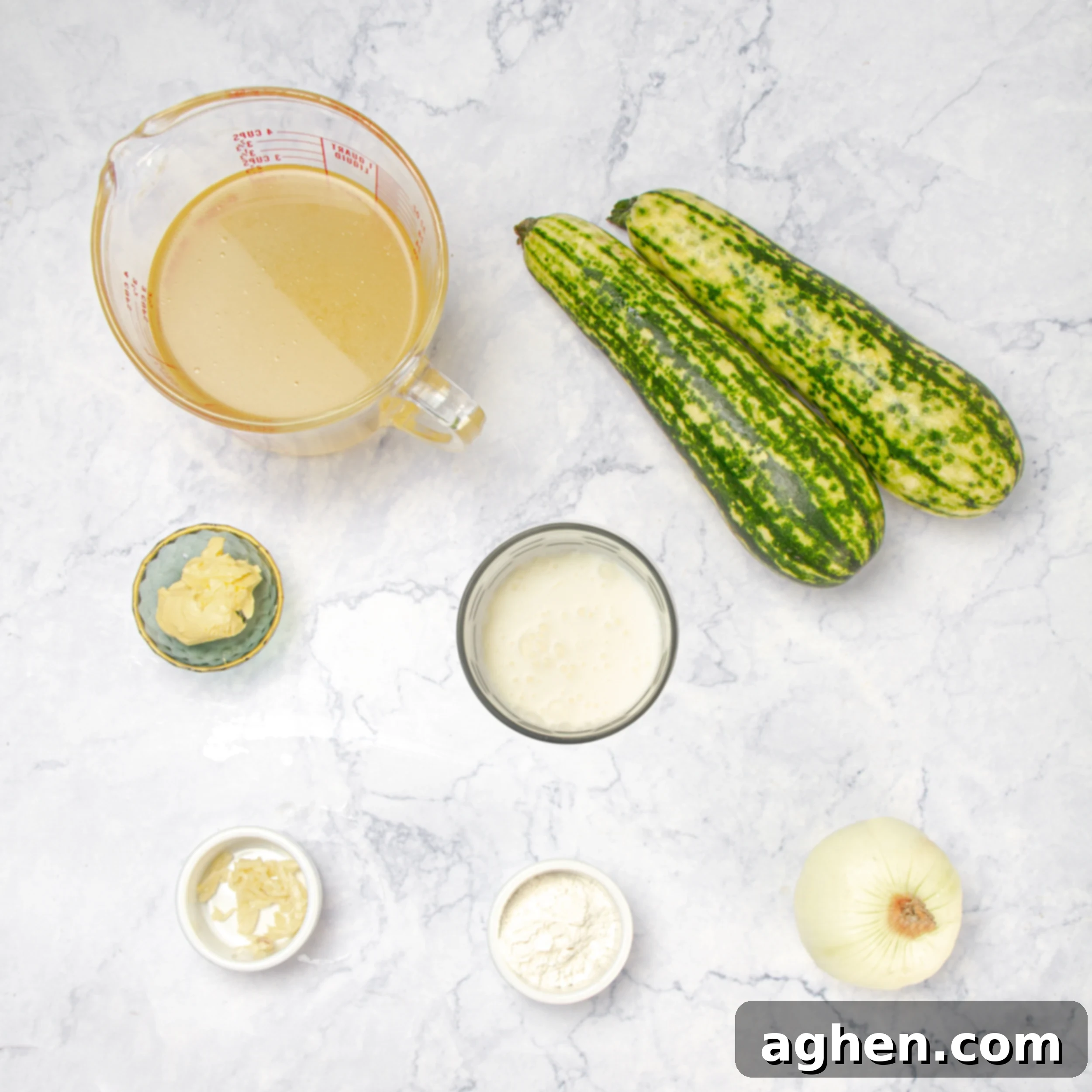 Light Zucchini Cream Soup: A Fun Fresh Spin 3 Zucchini cream soup ingredients in separate dishes on a counter.