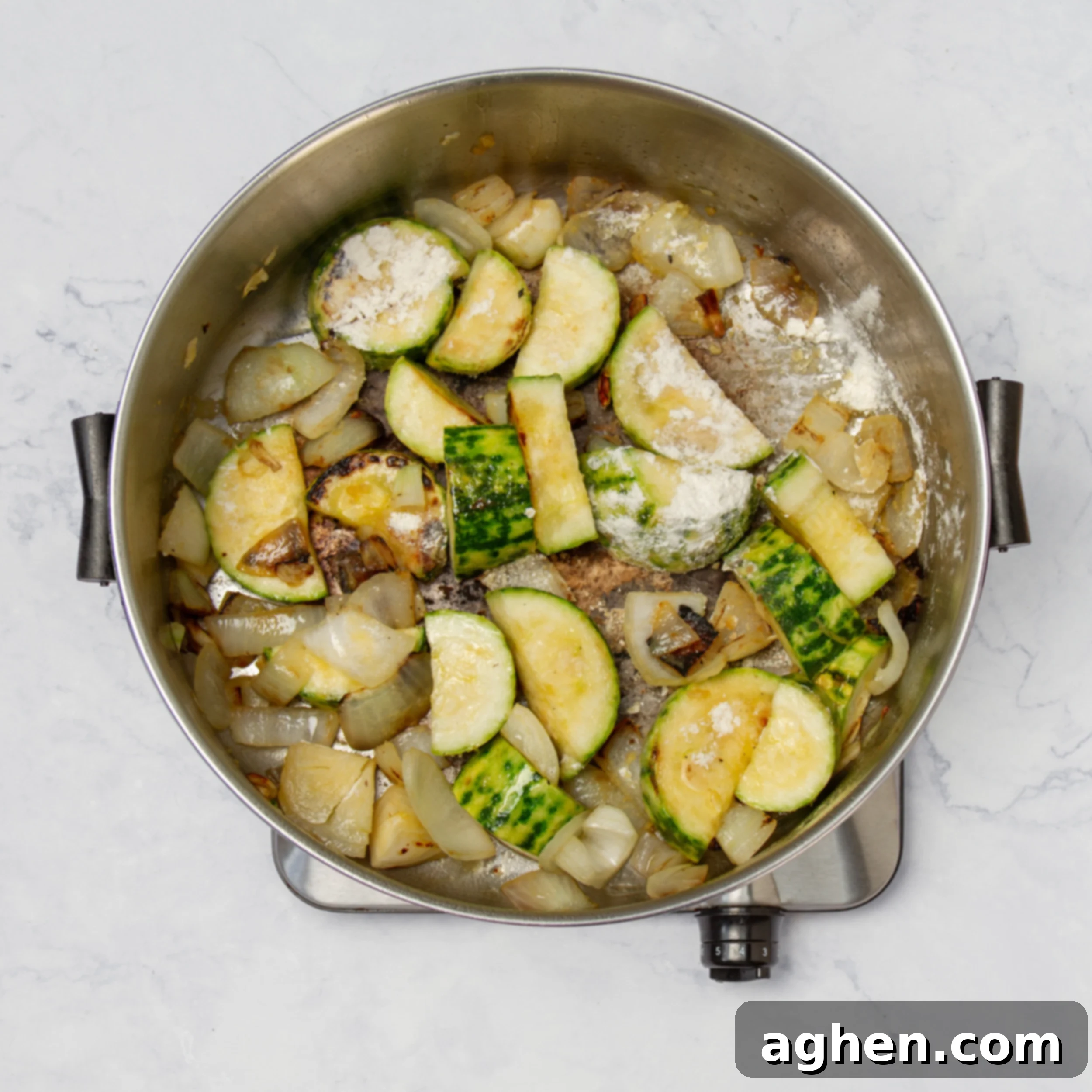 Light Zucchini Cream Soup: A Fun Fresh Spin 5 Onion and zucchini sauteing in a soup pot.