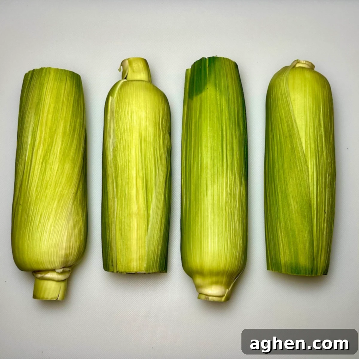 Smoked Corn: The Taste of Summer 3 corn on the cob in husks
