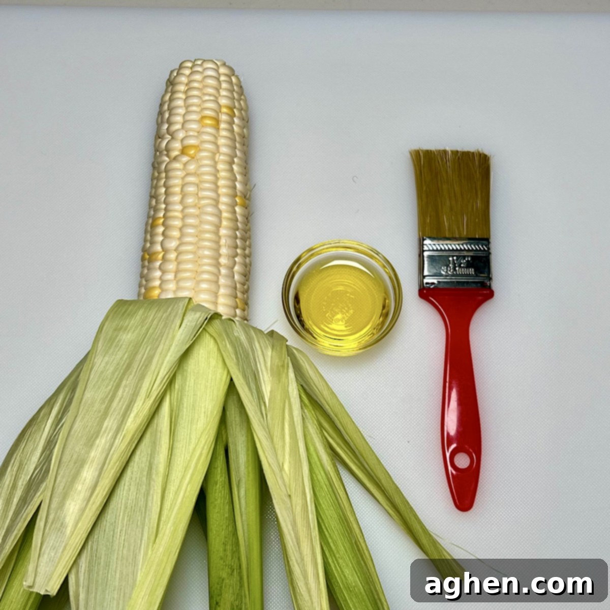 Smoked Corn: The Taste of Summer 5 corn on the cob with olive oil and brush