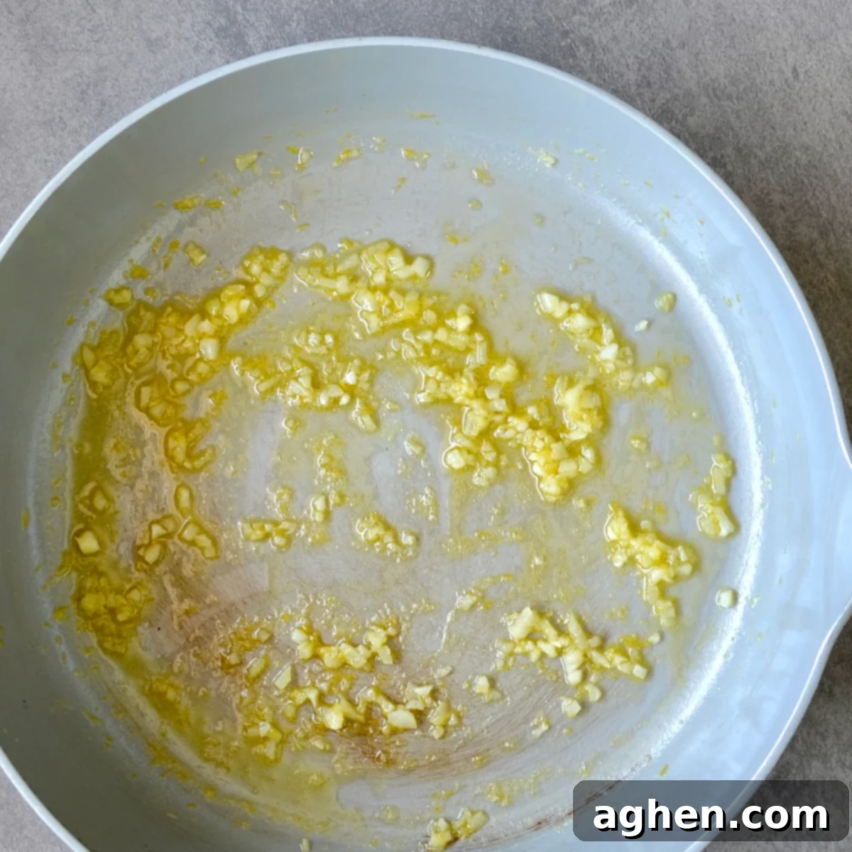 Cooking butter, zest, and garlic in a pan