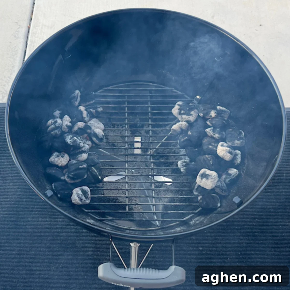 indirect heat setup on a weber kettle for smoking ribs