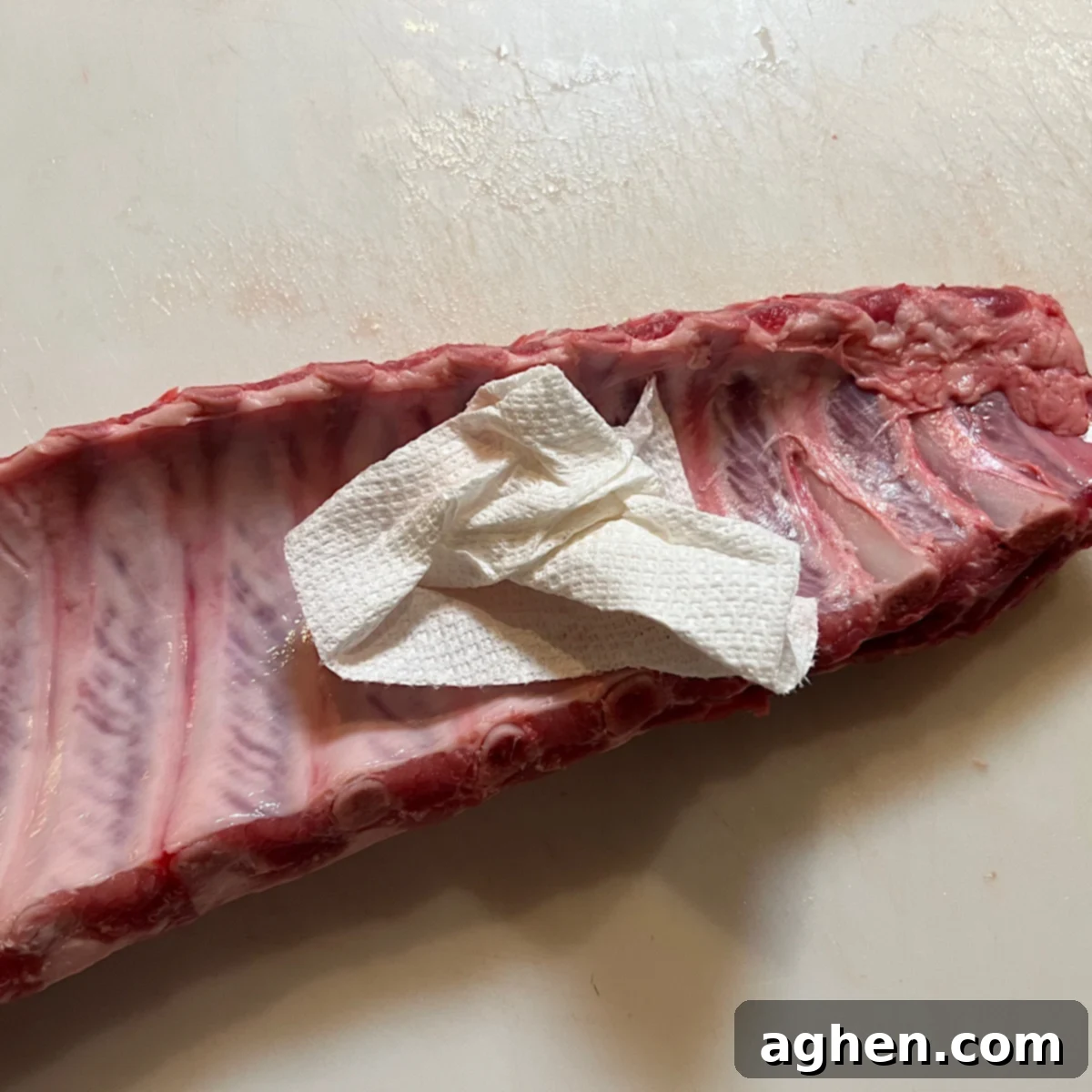 using paper towel to remove membrane from pork ribs